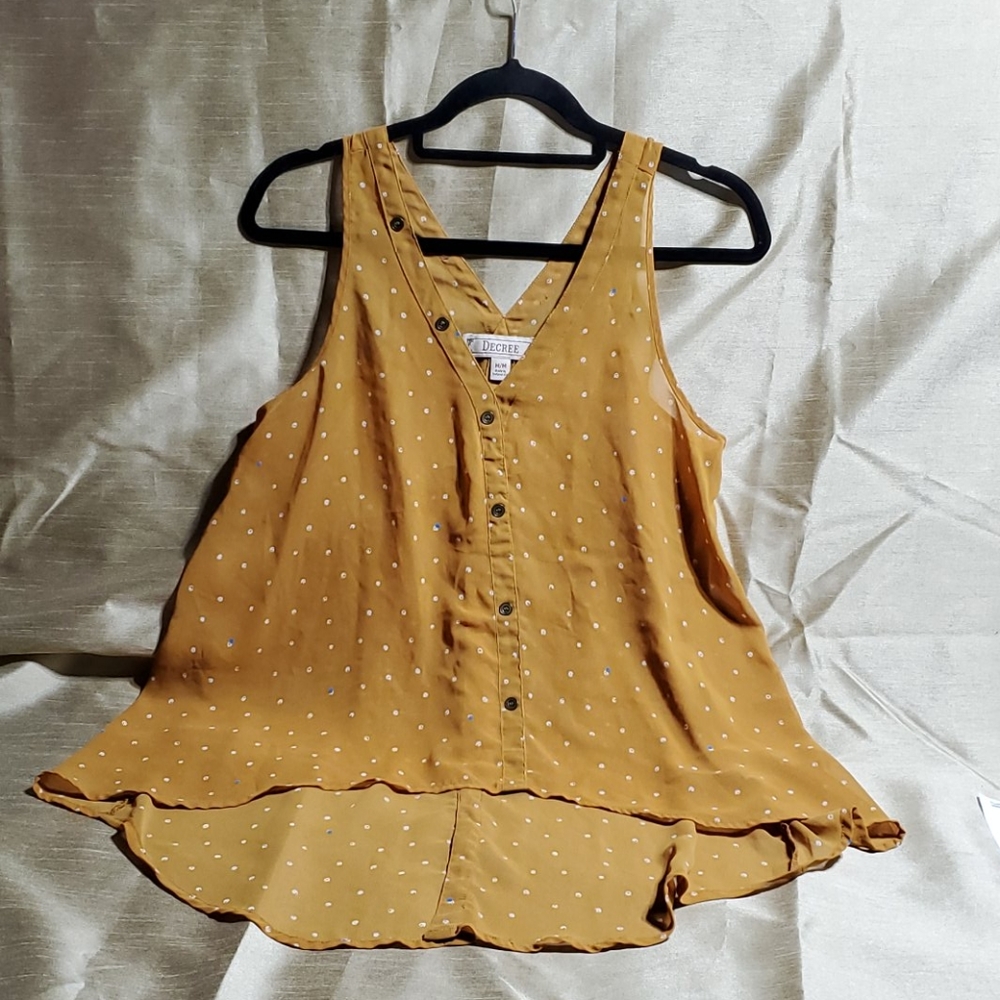 Decree, tan colored, sleeveless, shear top